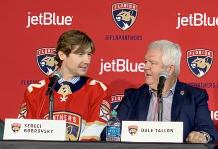 Dale Tallon with Sergei Bobrovsky